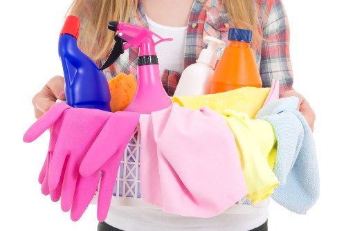 Professional office cleaners maintaining a Clapham workspace